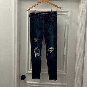 American Eagle ripped skinny jeans. Dark wash - size 4 short